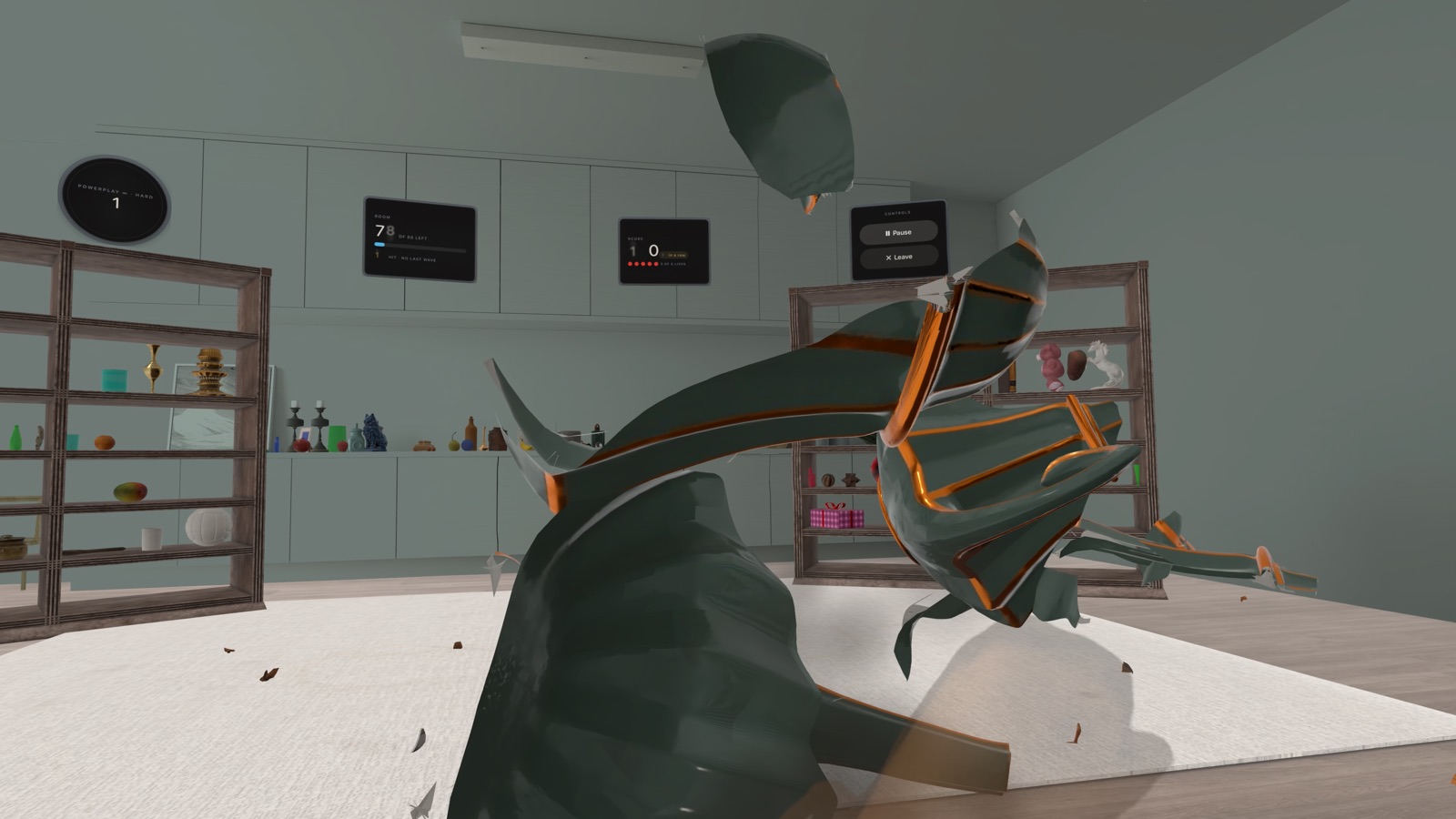 A teal porcelain teapot shattering in mid-air